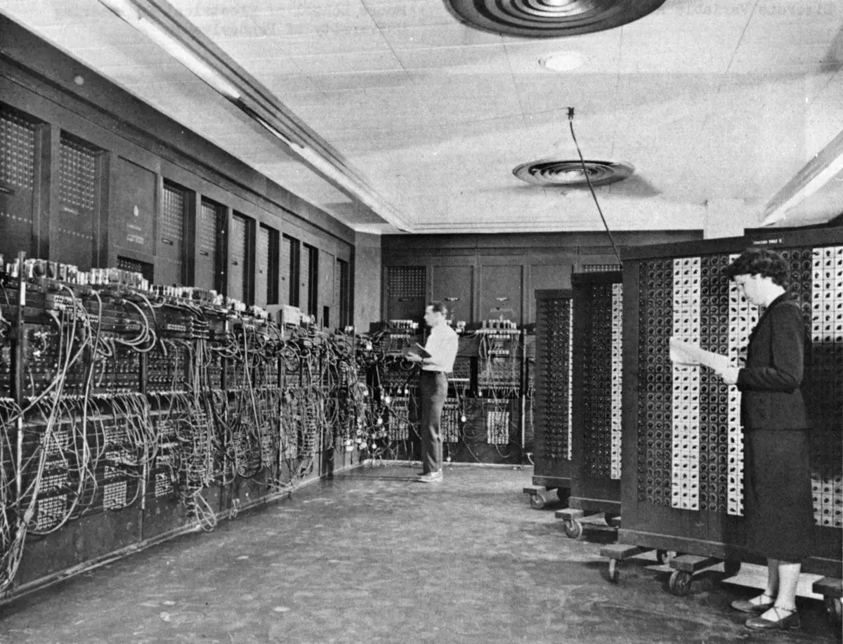 Technicians working on one of the first electronic computers