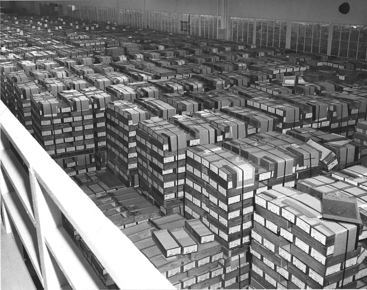 Warehouse of stacked punched cards, mid twentieth century